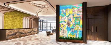 大理石調の受付カウンターと壁面アート